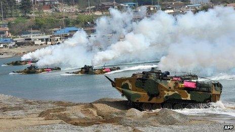 South Korean Marine amphibious assault vehicles land on the seashore during a joint landing operation by US and South Korean Marines in Pohang, 270 kms southeast of Seoul, on April 26, 2013.