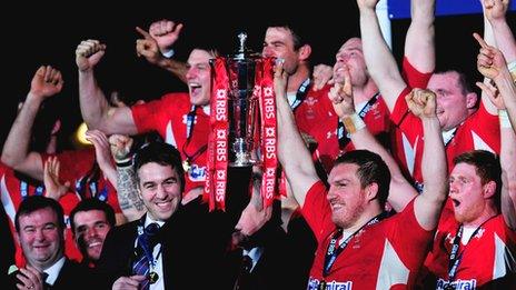 Wales players celebrate winning the Six Nations championship in 2013