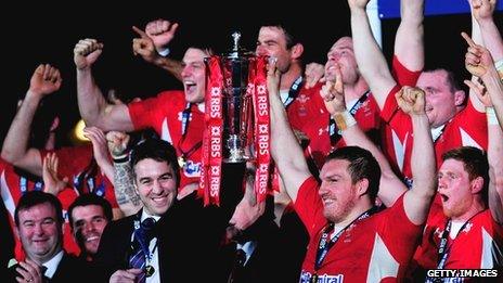 Wales players celebrate winning the Six Nations championship in 2013