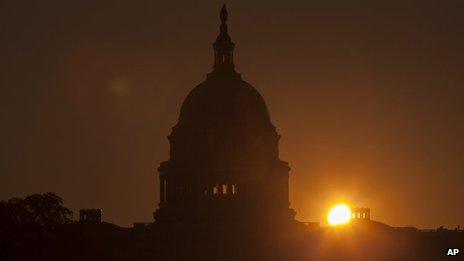 The sun rises over the Capitol in Washington 24 September 2013