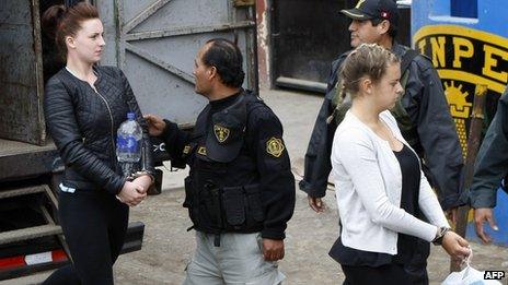 Michaella McCollum and Melissa Reid are led into the court hearing