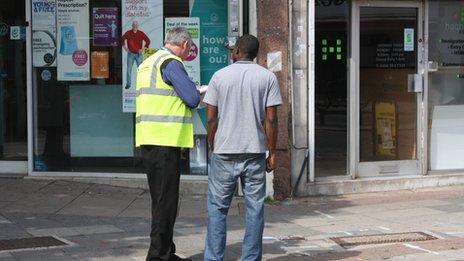 Unnamed prson being stopped by enforcement officer