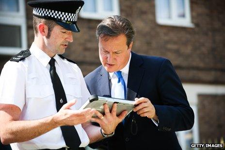 David Cameron and policeman, 2013