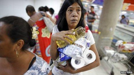 Supermarket customer in Venezuela, June 13