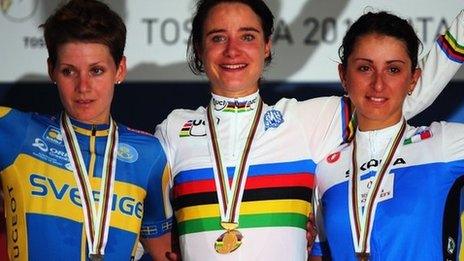 Women's road race word champion Marianne Vos (centre) with second-placed Emma Johansson (left) and Rossella Ratto in third (right)