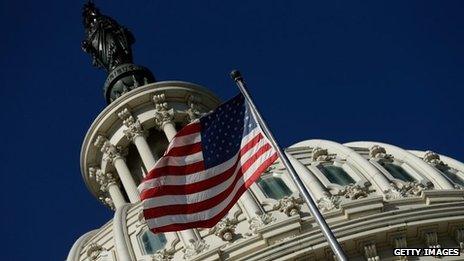 An American flag waves outside the US Capitol in Washington. Photo: 29 September 2013