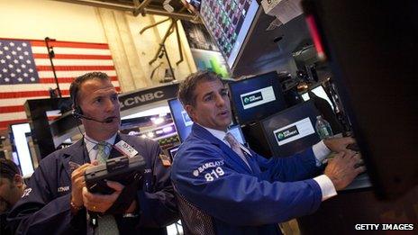 Traders on the floor of the NYSE