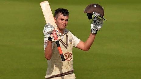 Dominic Sibley celebrates reaching his century for Surrey