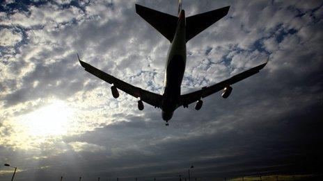 A plane comes into land at Heathrow Airport