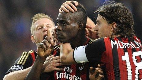 Mario Balotelli celebrates scoring for AC Milan against Ajax