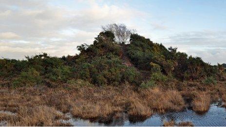 The damaged Bronze Age barrow