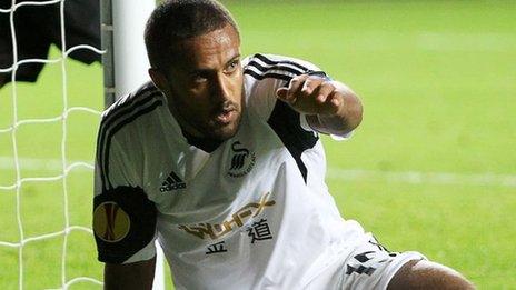 Wayne Routledge celebrates after scoring Swansea's goal