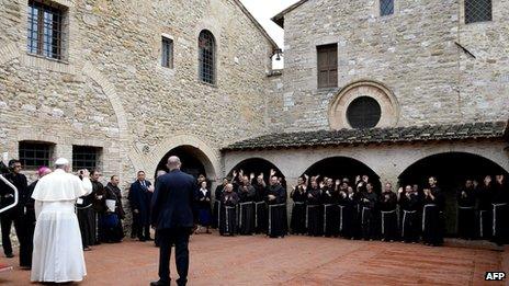 Pope Francis (L) visits the San Damian monastery on 4 October 2013 near Assisi.