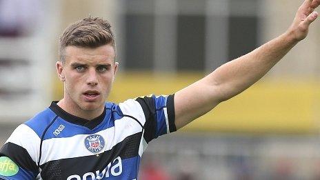 Bath fly-half George Ford raises his hand