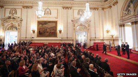 Duke of Cambridge with volunteers at Buckingham Palace reception