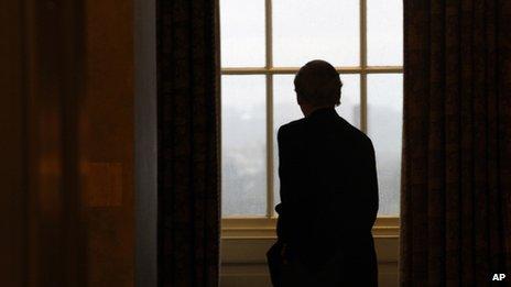 Senate Minority Leader Mitch McConnell looked out of a Capitol window as he returned to his office on 7 October 2013