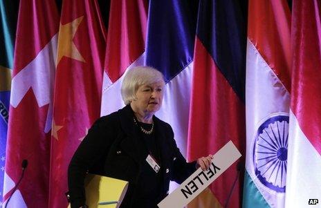 Janet Yellen with her name sign