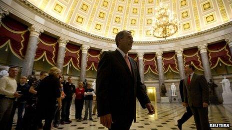 House Speaker John Boehner walks to a house vote on border safety and security on Capitol Hill in Washington 10 October 2013