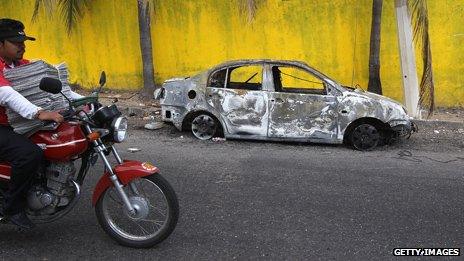 A burnt-out car in Acapulco