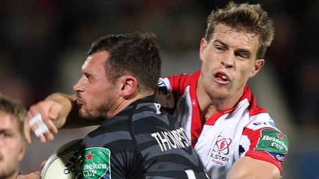 Adam Thompstone of Leicester is challenged by Ulster winger Andrew Trimble