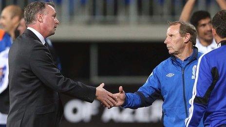 O'Neill shakes hands with Azerbaijan manager Bertie Vogts after the game