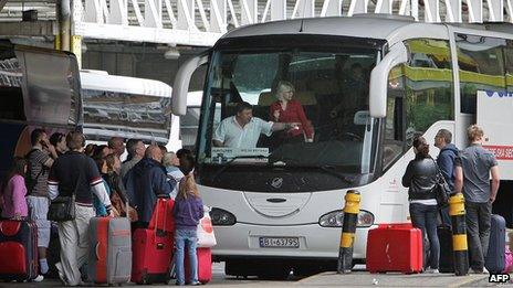 Poles boarding bus at Victoria Station, London, 20 May 09