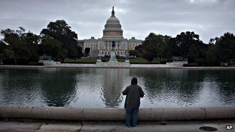 Cloudy skies shroud the Capitol in Washington, Monday morning, Oct. 14, 2013