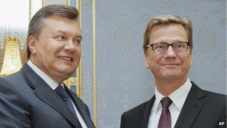 Ukrainian President Viktor Yanukovych, left, with German Foreign Minister Guido Westerwelle, 21 Jun 13