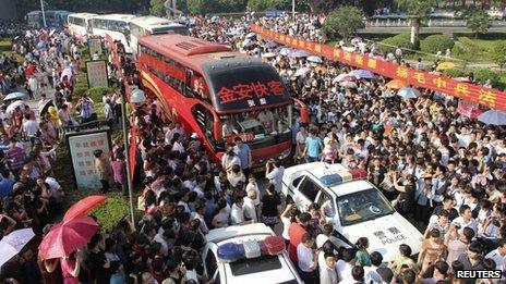 Parents seeing off children taking gaokao exam, in Anhui province