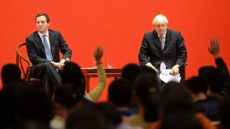 British Chancellor George Osborne and London Mayor Boris Johnson at Peking University in Beijing on October 14, 2013