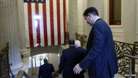 US Senator Marco Rubio departs after a Republican Senate caucus meeting at the US Capitol on 16 October 2013