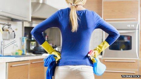 Woman contemplating housework