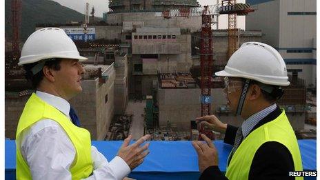 George Osborne chats with Taishan Nuclear Power General Manager Guo in front of nuclear reactor under construction in Taishan (17 Oct 2013)