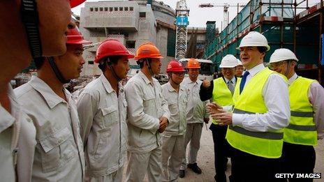 George Osborne talks with workers at Taishan power plant (17 Oct 2013)