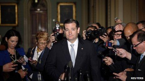 Reporters gather around Senator Ted Cruz at the US Capitol on 16 October 2013