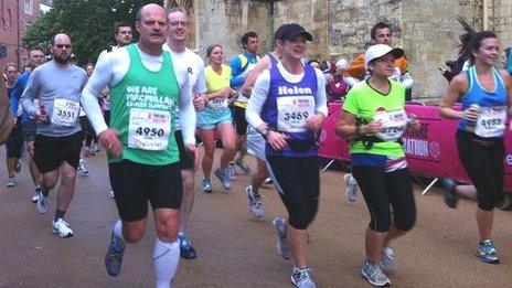 Runners passing York Minster