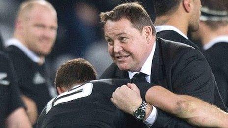 All Blacks coach Steve Hansen wrestles with full-back Israel Dagg after their win over Australia