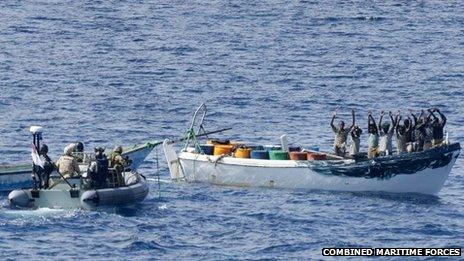 HMAS Melbourne's boarding team approaches suspected pirates