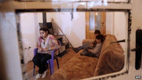 Leonarda Dibrani sits at her home in the town of Mitrovica on 16 October 2013