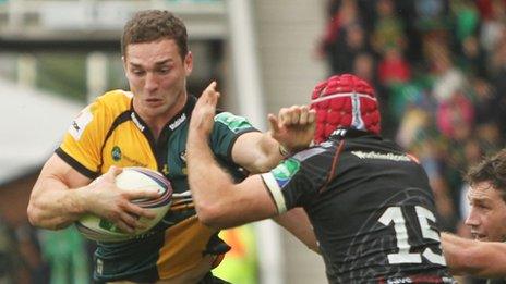 Northampton's George North tackled by Ospreys' Richard Fussell