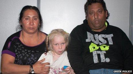 A undated handout photo released by the Greek Police on 21 October 2013 shows Maria (C) together with the couple posing as her parents at an undisclosed location