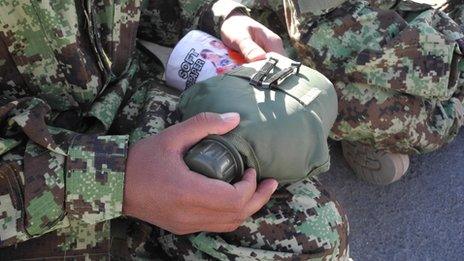 Afghan officer cadet with new water bottle (pic: David Loyn)