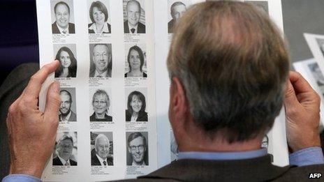 A delegate reads a list of the new parliamentarians