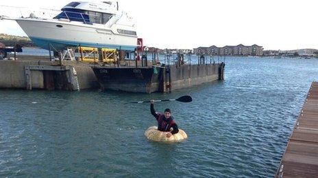 Man paddling a pumpkin