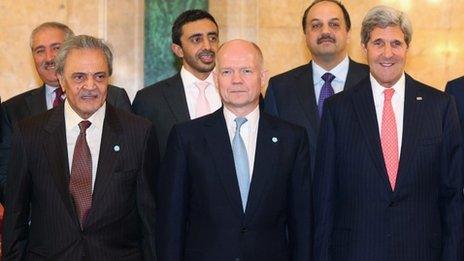 Prince Saud al-Faisal (left) and John Kerry (right) at a meeting of the Friends of Syria in London (22 October 2013)