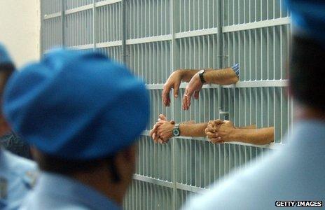 Members of the mafia Camorra Casalesi clan stand during the reading of the sentences in the Spartacus trial