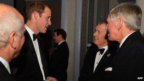 Prince William speaks to 1966 England World Cup team members Geoff Hurst (2nd R) and Martin Peters (R)