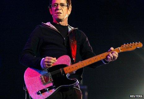 Lou Reed plays the guitar during his concert in Santiago de Compostela in 2004