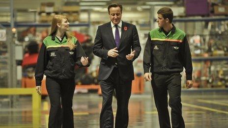 Cameron with apprentices at BMW Mini plant