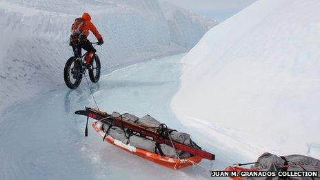 Bike pulling sledges in Greenland